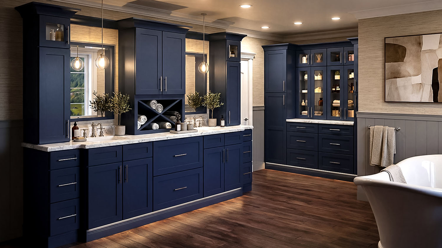 Navy blue double-sink bathroom vanity with linen tower and marble countertop